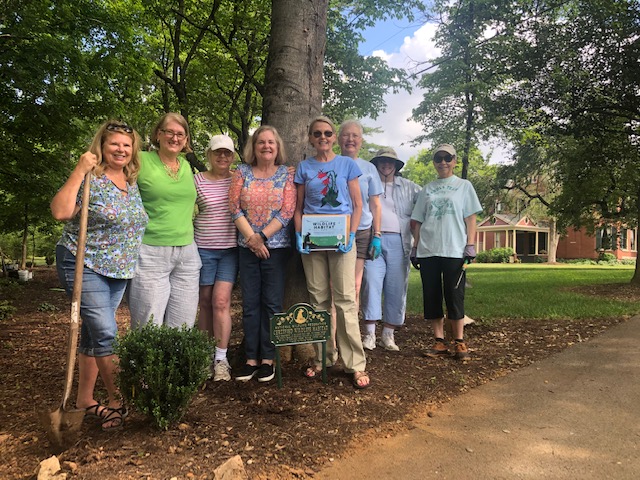 Members work at Historic Westwood Shade Garden